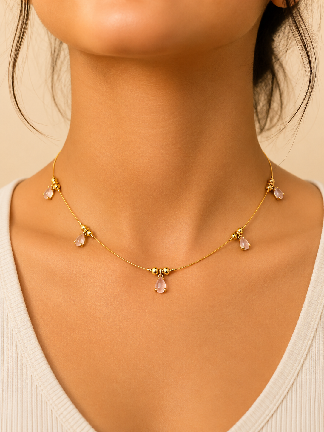 Elegant Invisible Necklace with Pink Teardrop Stones